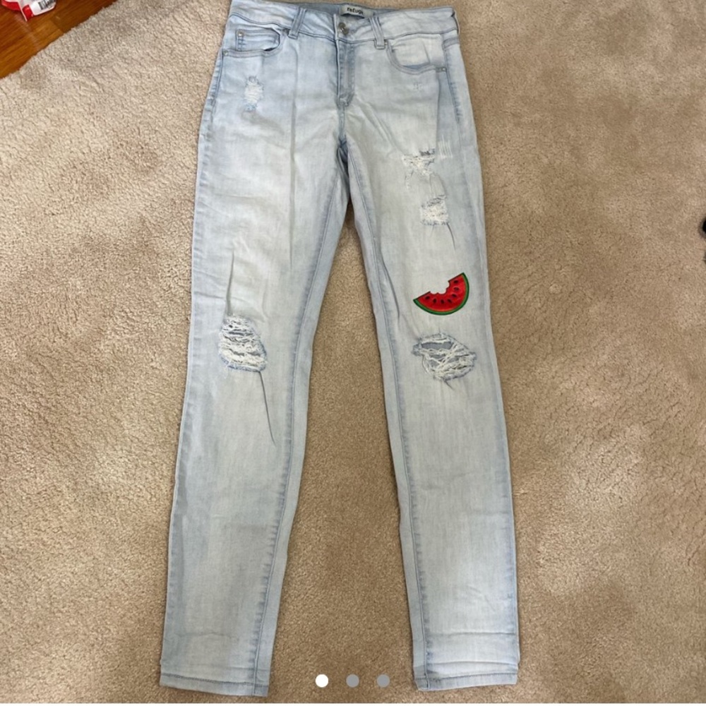 Light wash jeans with patches
